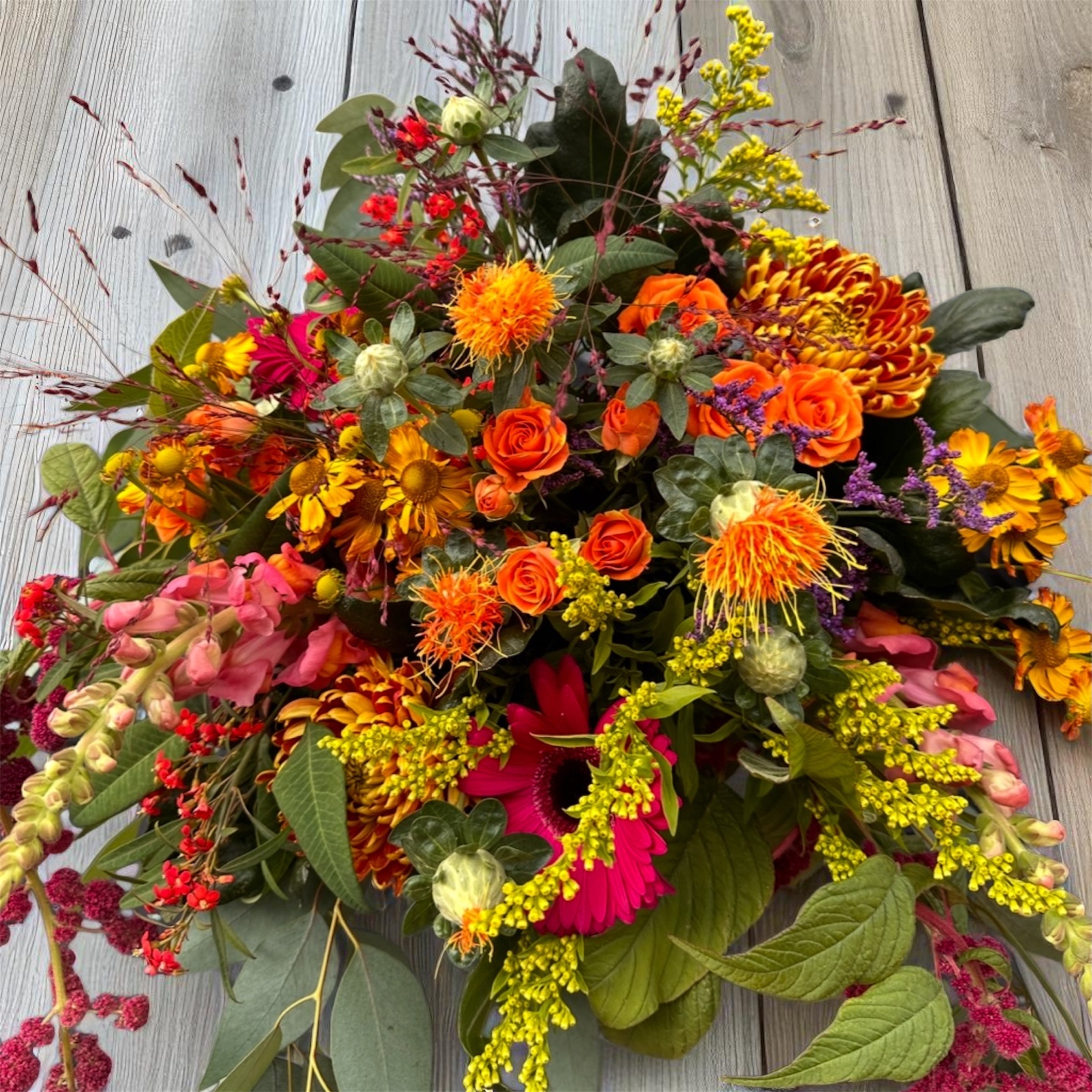 Rich Autumn Floral Posy in Oranges, reds and hot pinks
