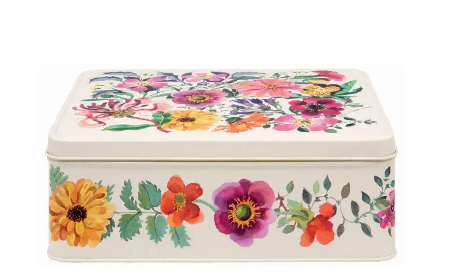 Colourful floral tin with chocolate chip biscuits inside