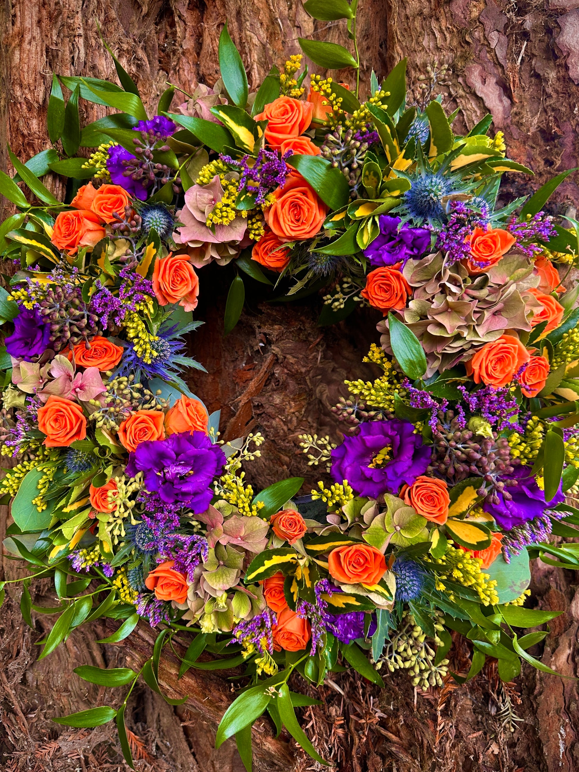 Purple, orange and yellow wreath