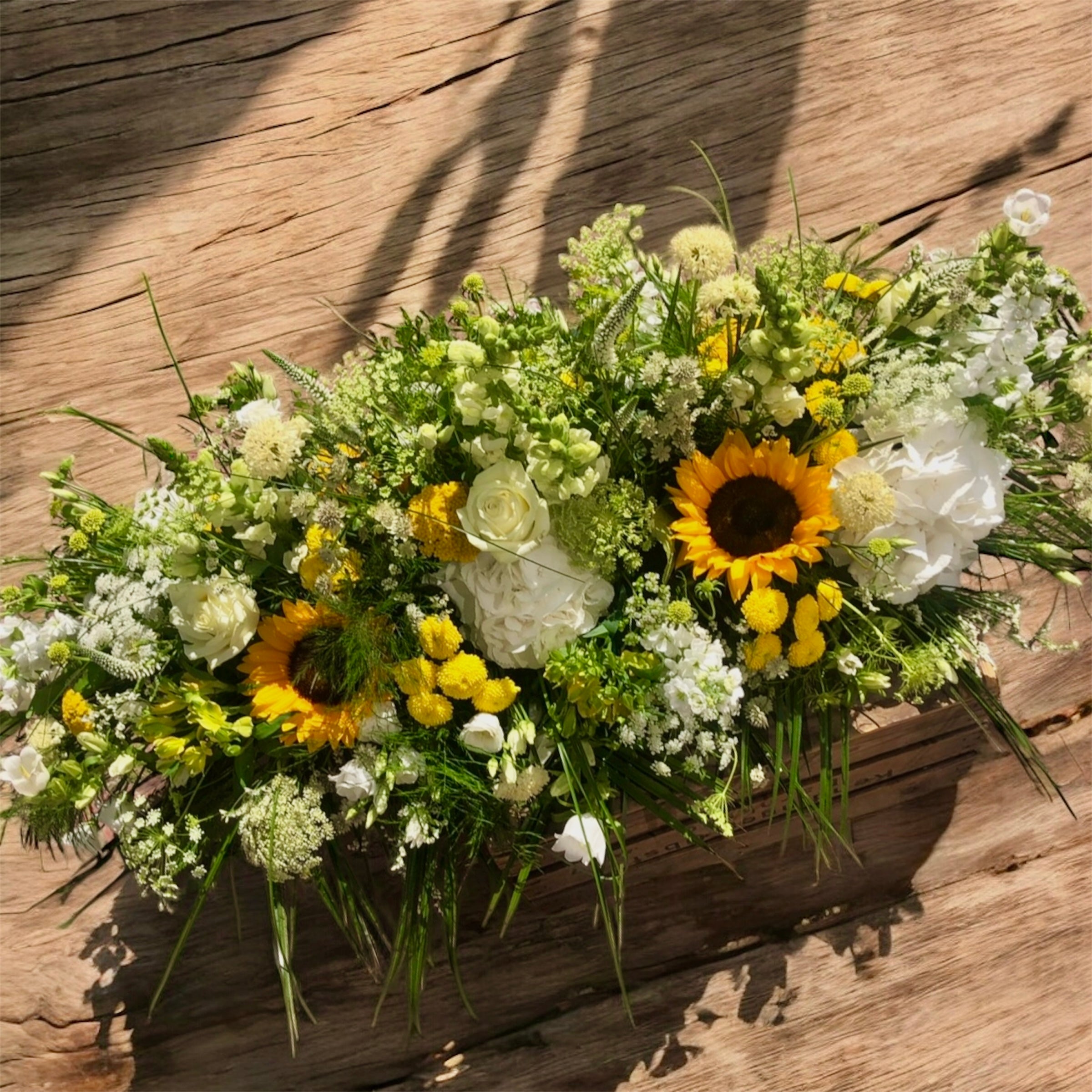 Yellows, Lemons and White casket spray