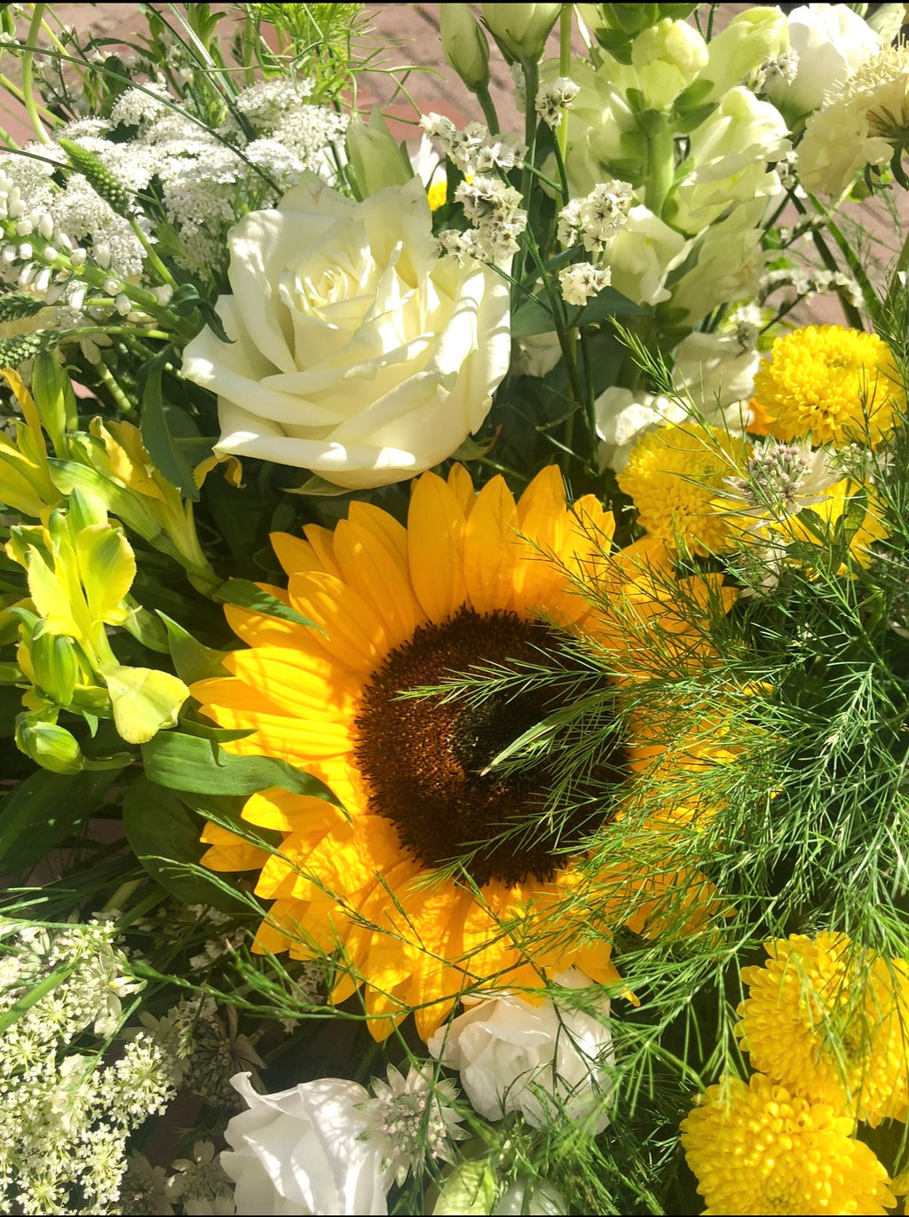 yellow and white casket spay