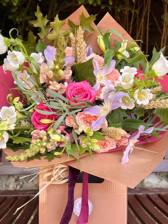 Flowers in the colours of pink’s, lilac’s white.