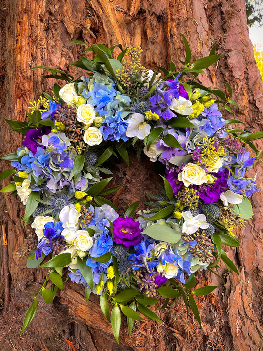 Blues purples and white floral wreath