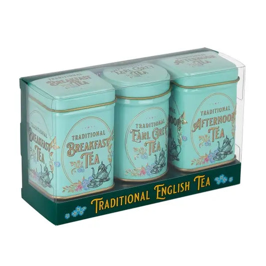 Three teal tea tins with different types of tea on labels, in a clear packaging box. English breakfast, earl grey and afternoon tea. Loose leaf